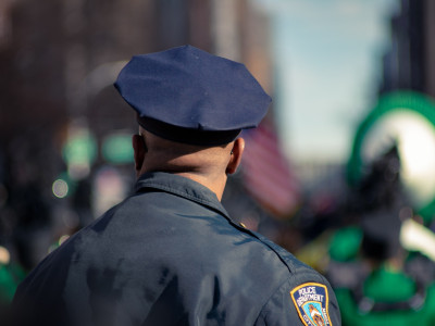 man wearing police uniform selective focus photo